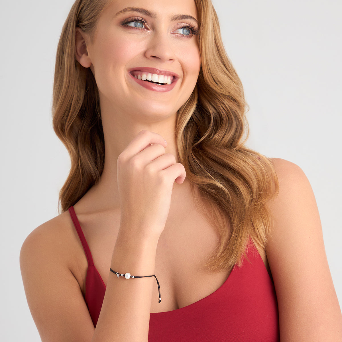 Bransoletka srebrna na sznurku z perłą