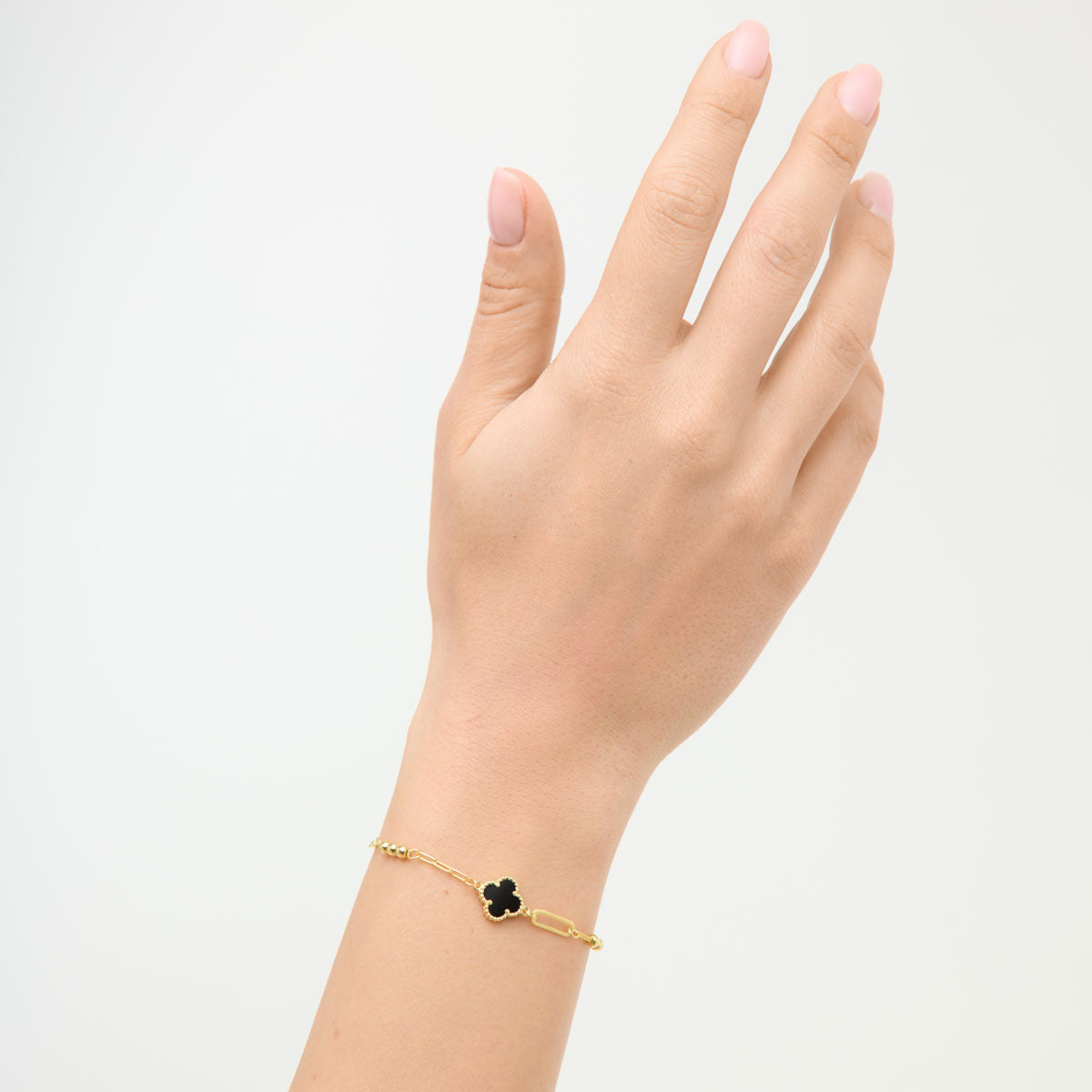 Bransoletka srebrna pozłacana z czarnym onyksem - koniczyna