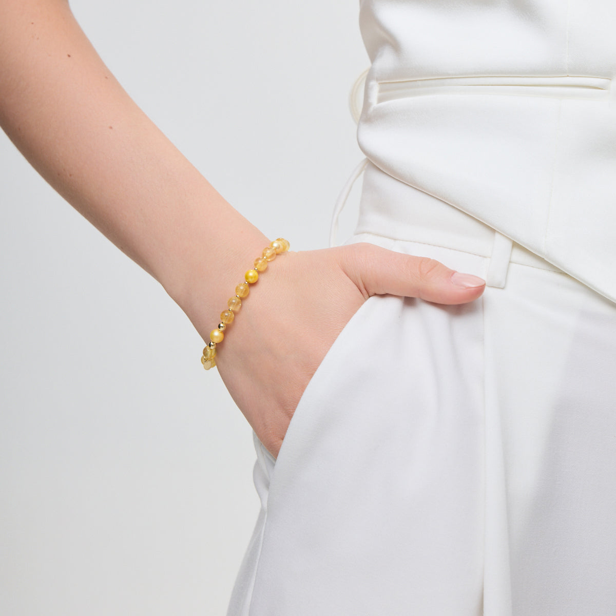 Bransoletka srebrna pozłacana z żółtą perłą i cytrynami - kulki