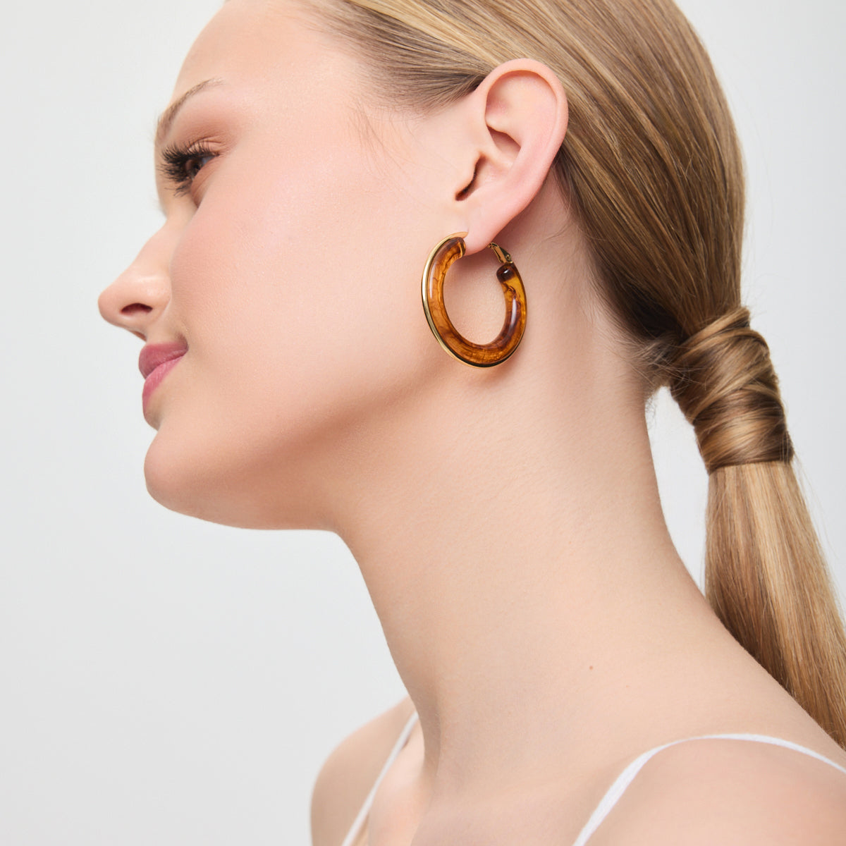 Kolczyki stalowe z brązowym szkłem - koła - Moderno