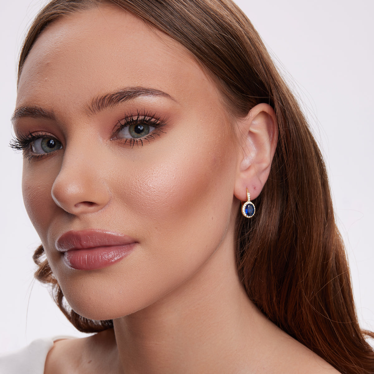 Kolczyki srebrne pozłacane z niebieskimi cyrkoniami