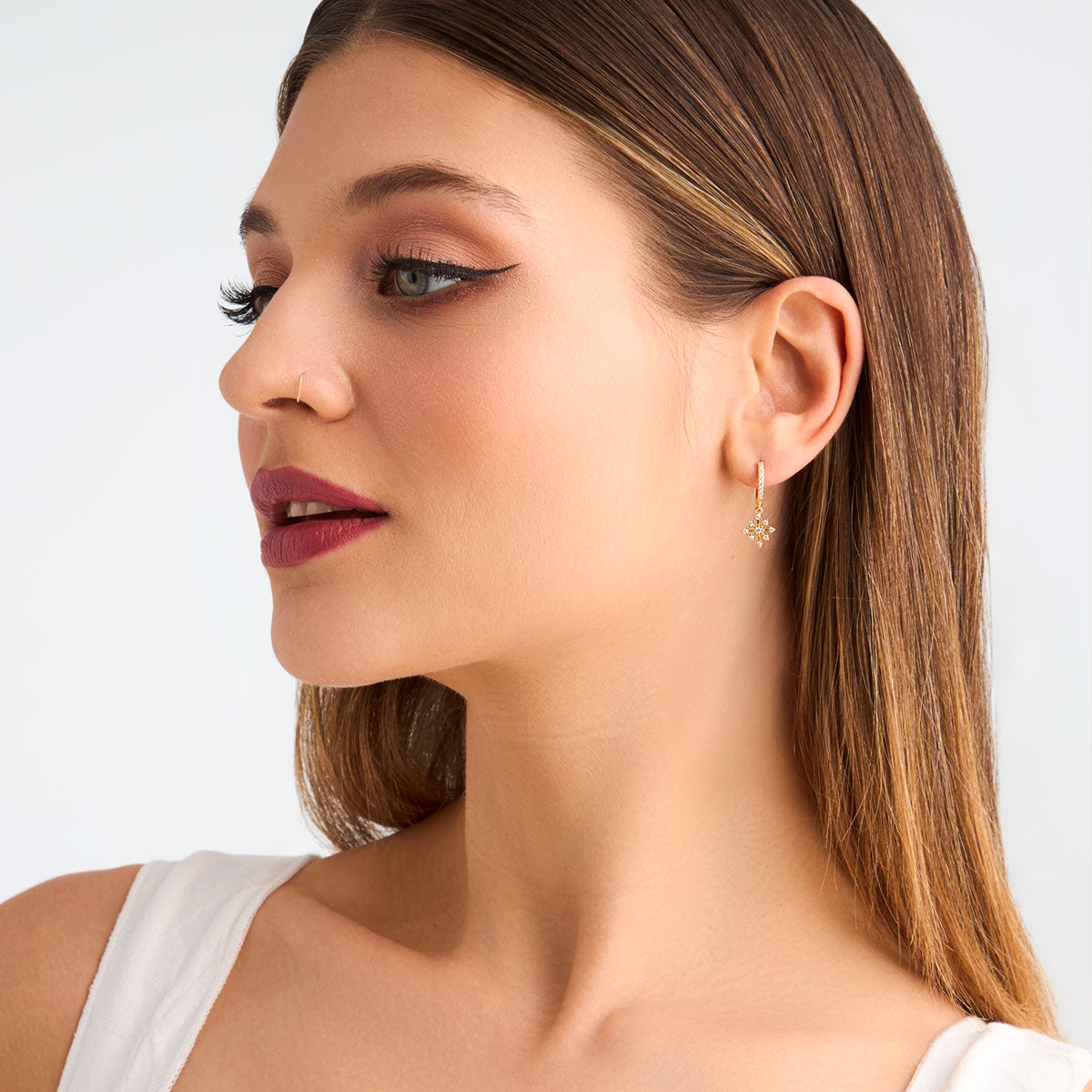 Kolczyki srebrne pozłacane z cyrkoniami - śnieżynki