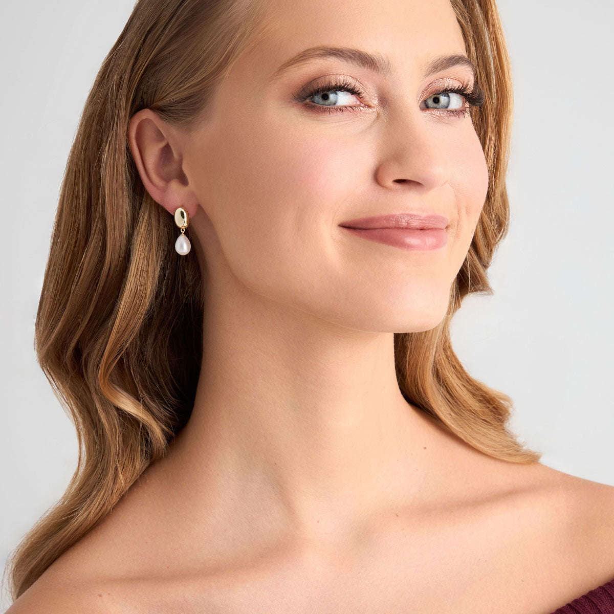 Kolczyki srebrne pozłacane wiszące z perłami