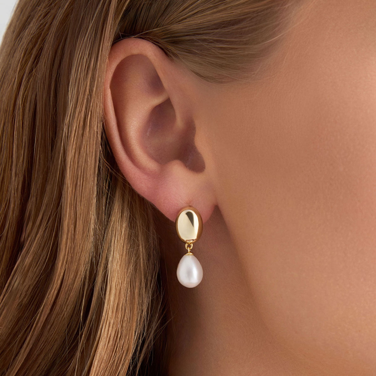 Kolczyki srebrne pozłacane wiszące z perłami