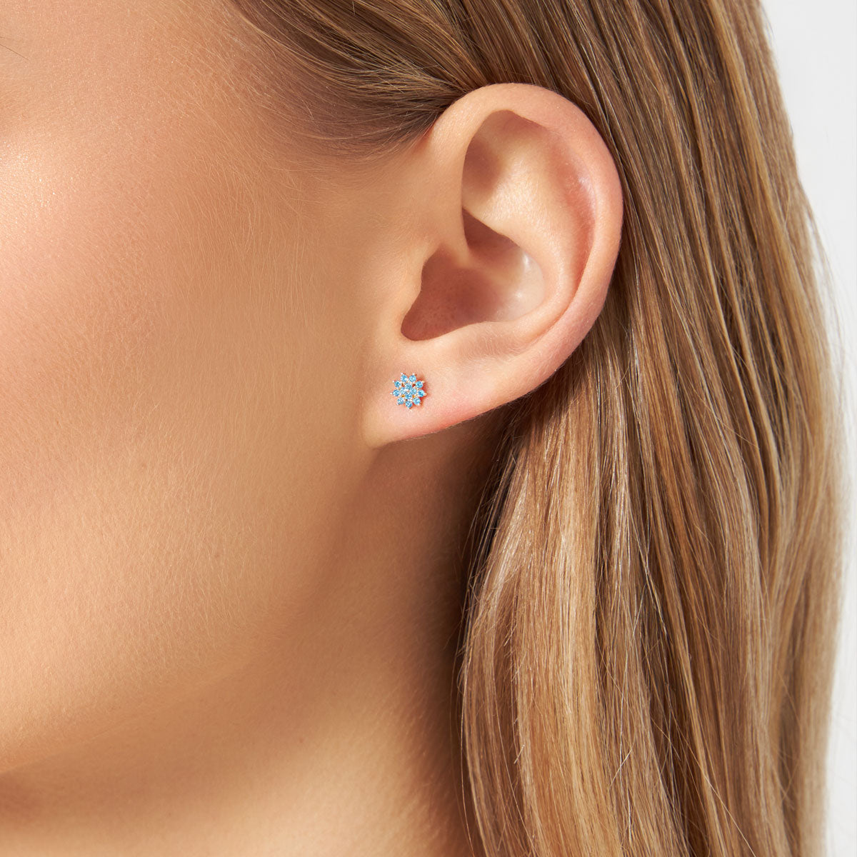 Kolczyki złote z błękitnymi cyrkoniami - kwiaty