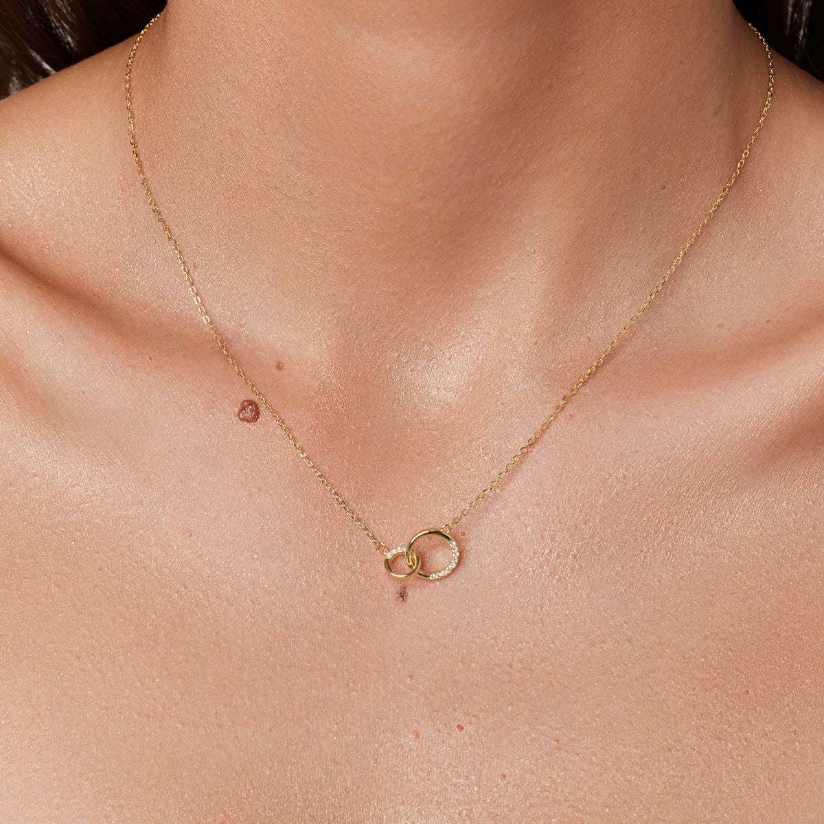 Naszyjnik srebrny pozłacany z cyrkoniami - koła