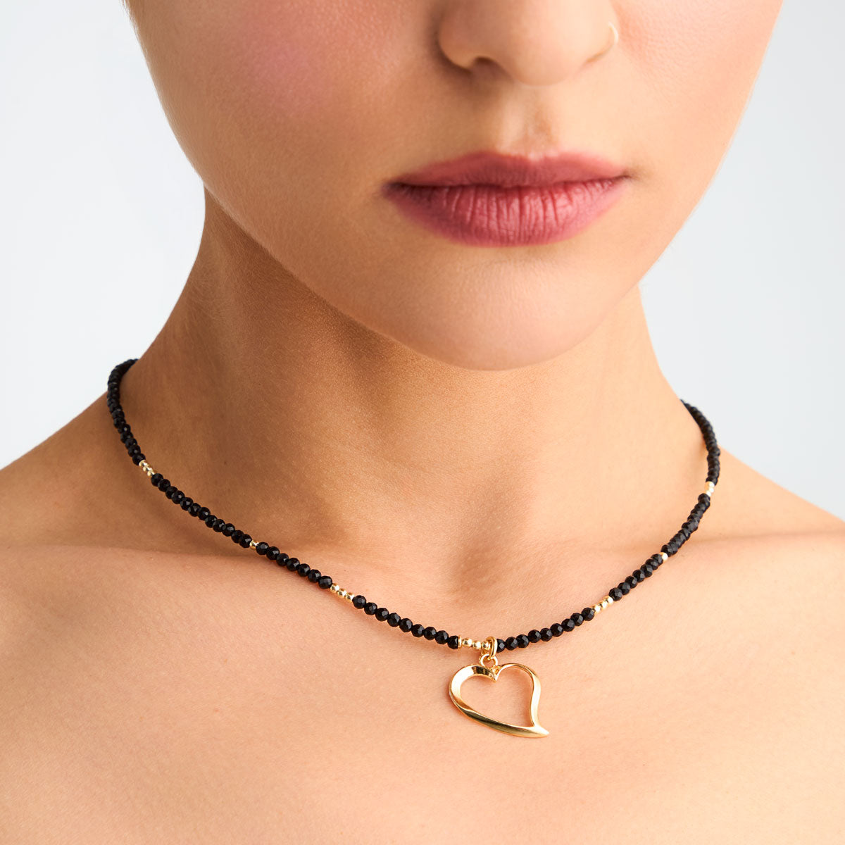 Naszyjnik srebrny pozłacany z onyksem - serce