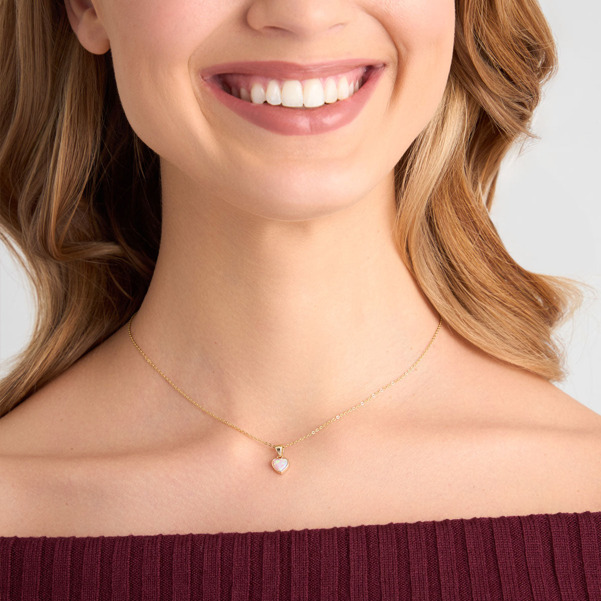 Zawieszka złota z syntetycznym opalem - serce