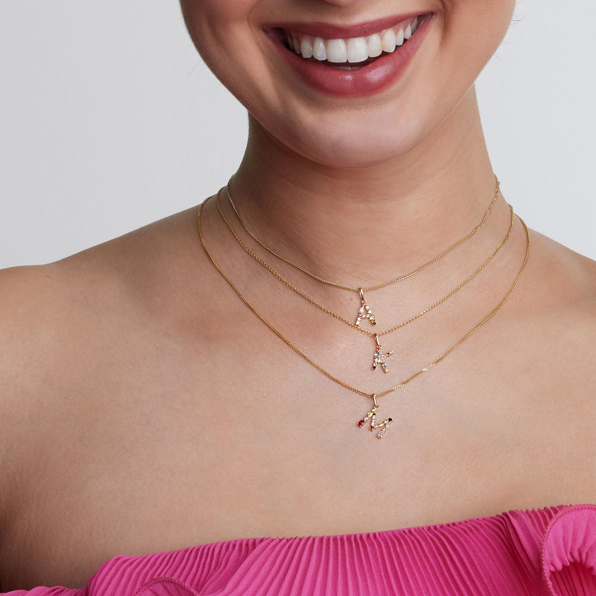 Zawieszka złota z cyrkoniami - A - Motivo