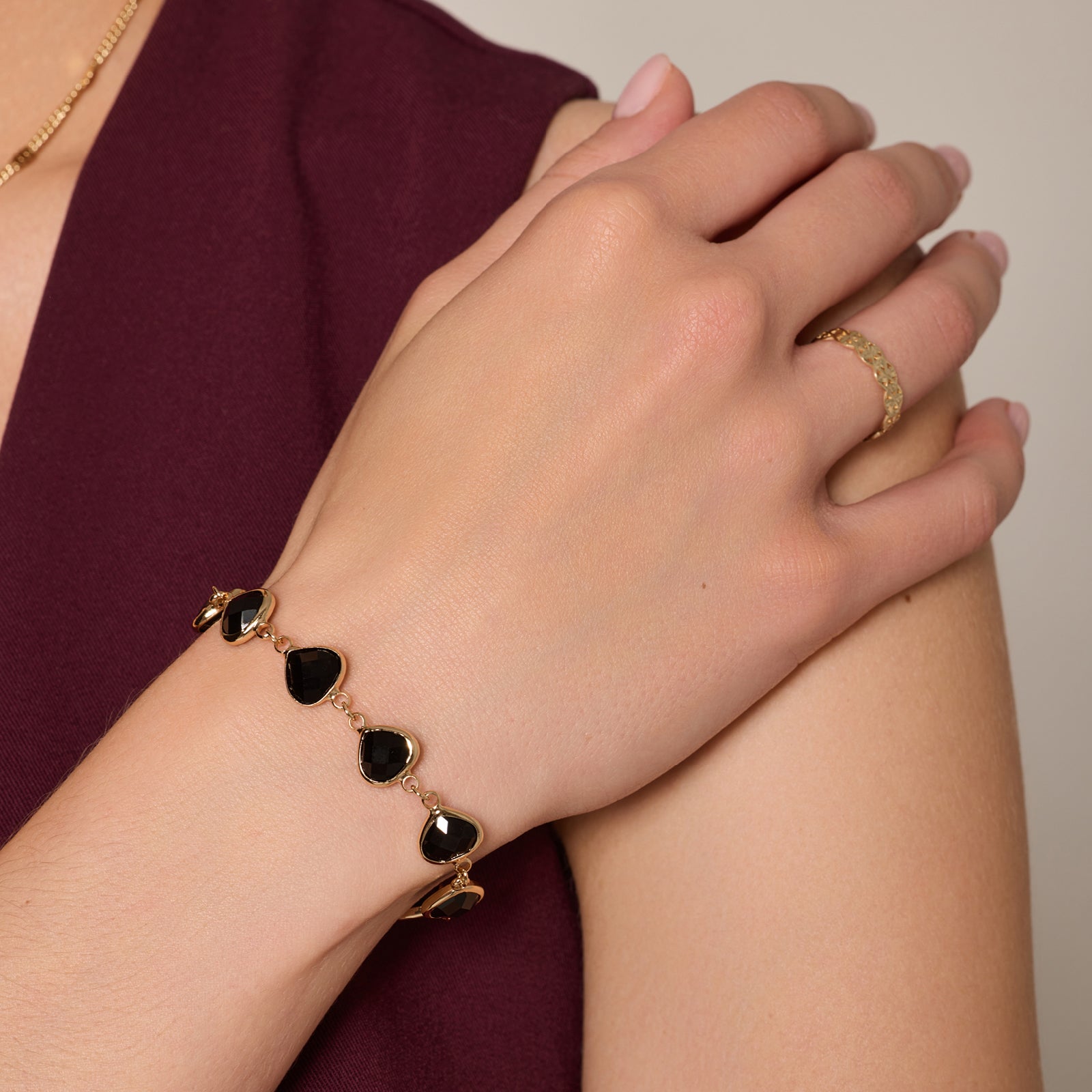 Komplet biżuterii z mosiądzu pozłacany z czarnym oczkiem