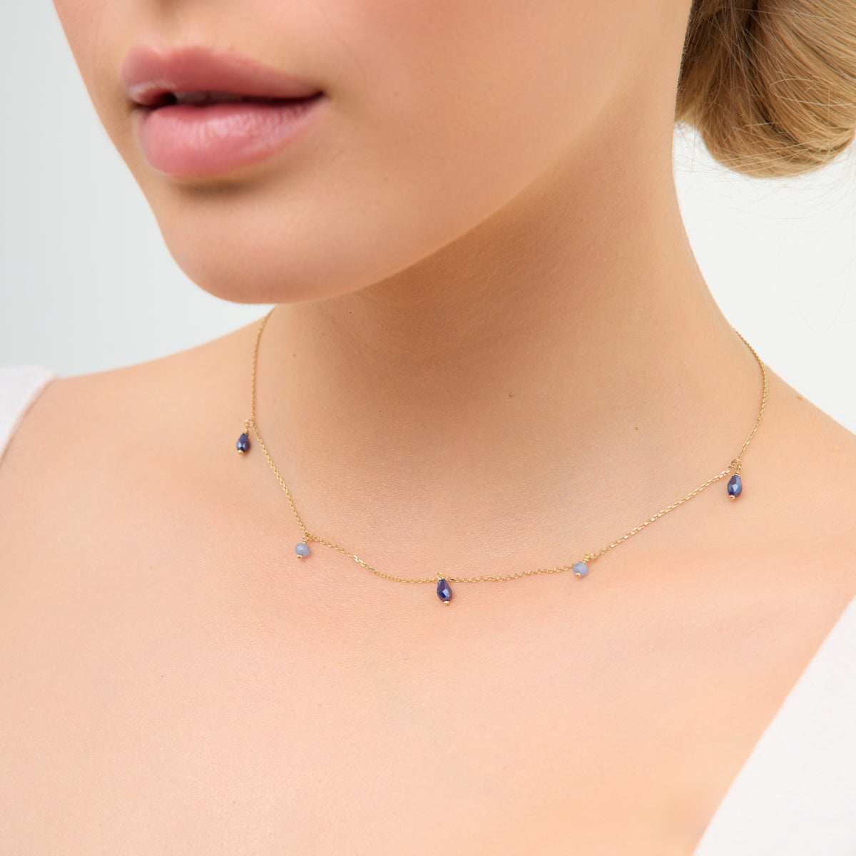 Komplet biżuterii srebrnej pozłacany z niebieskimi koralikami