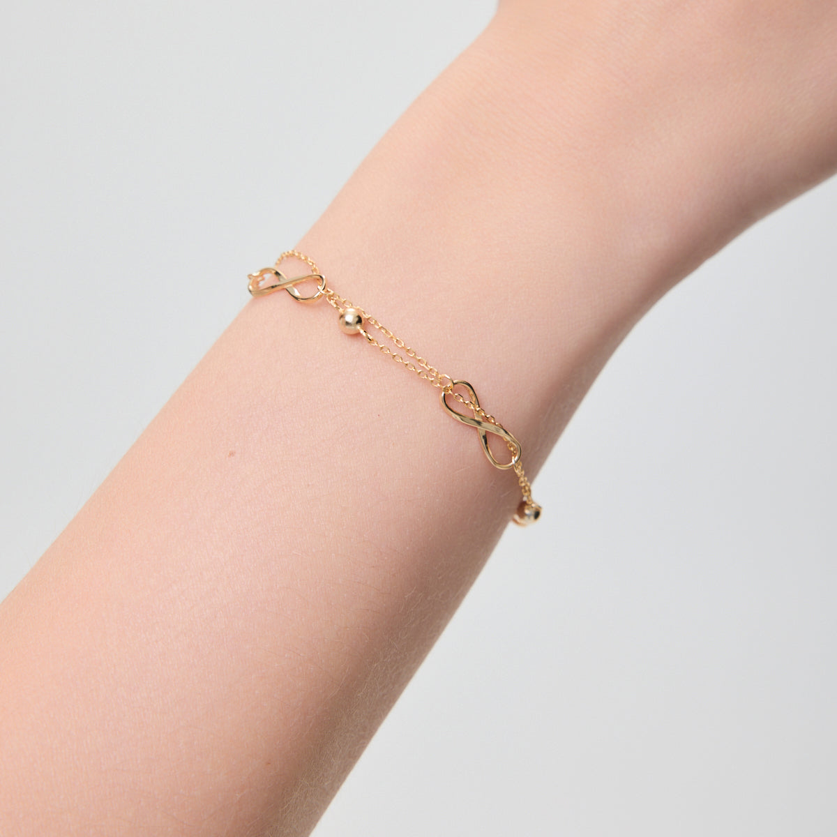 Bransoletka srebrna pozłacana - nieskończoność