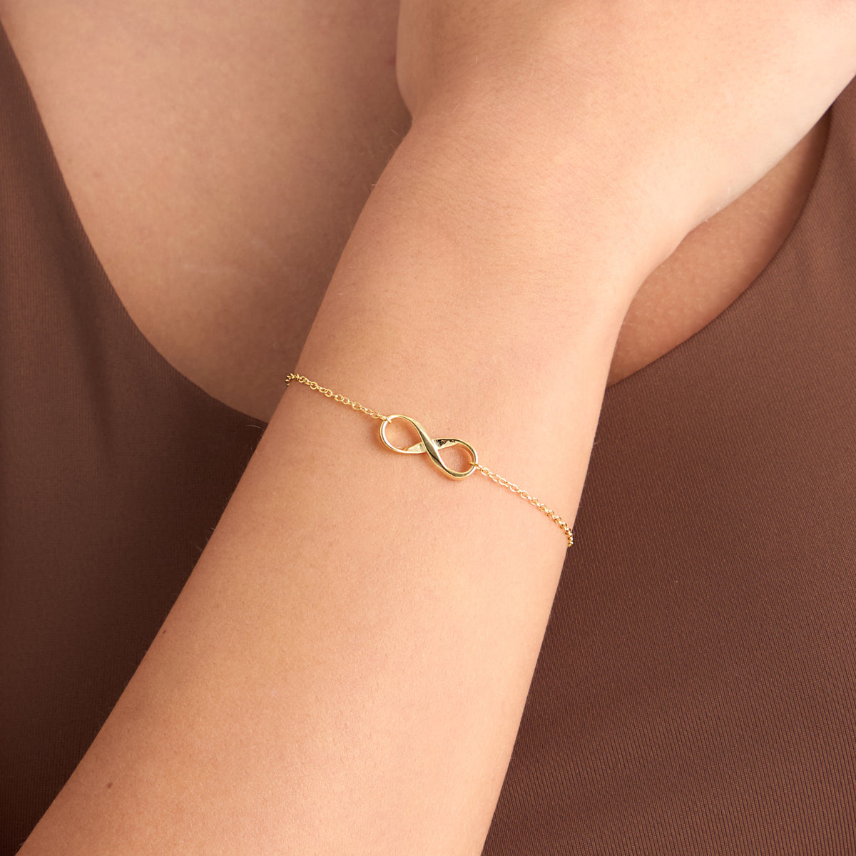Bransoletka srebrna pozłacana - nieskończoność