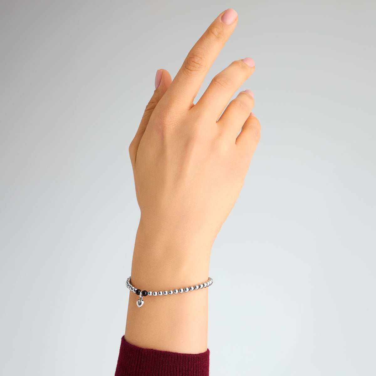 Bransoletka srebrna z hematytem i onyksem - kulki - serce