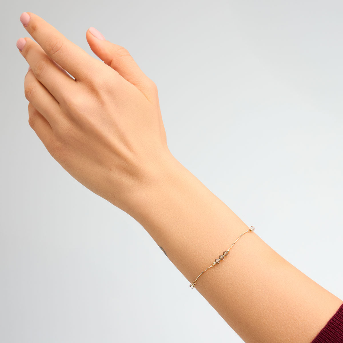 Bransoletka złota z cyrkoniami - kulki