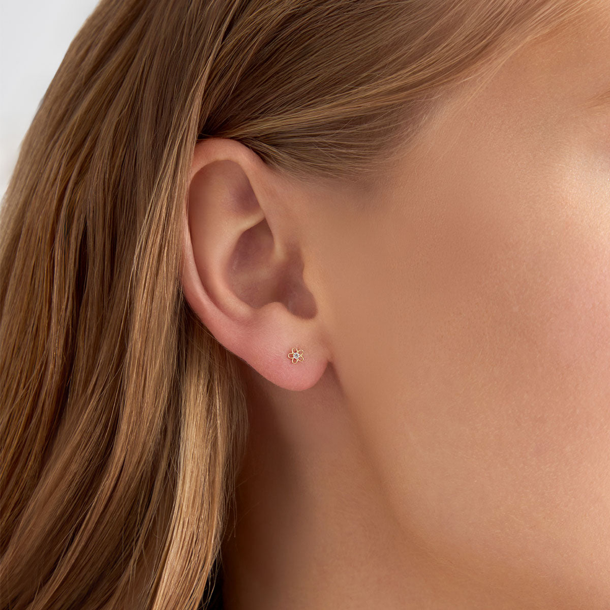 Kolczyki złote z bezbarwnymi cyrkoniami - kwiaty