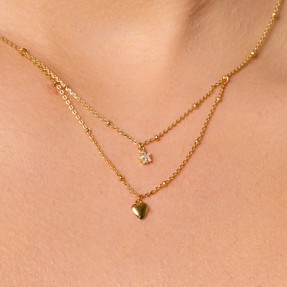 Naszyjnik srebrny pozłacany kaskadowy z cyrkonią - serce
