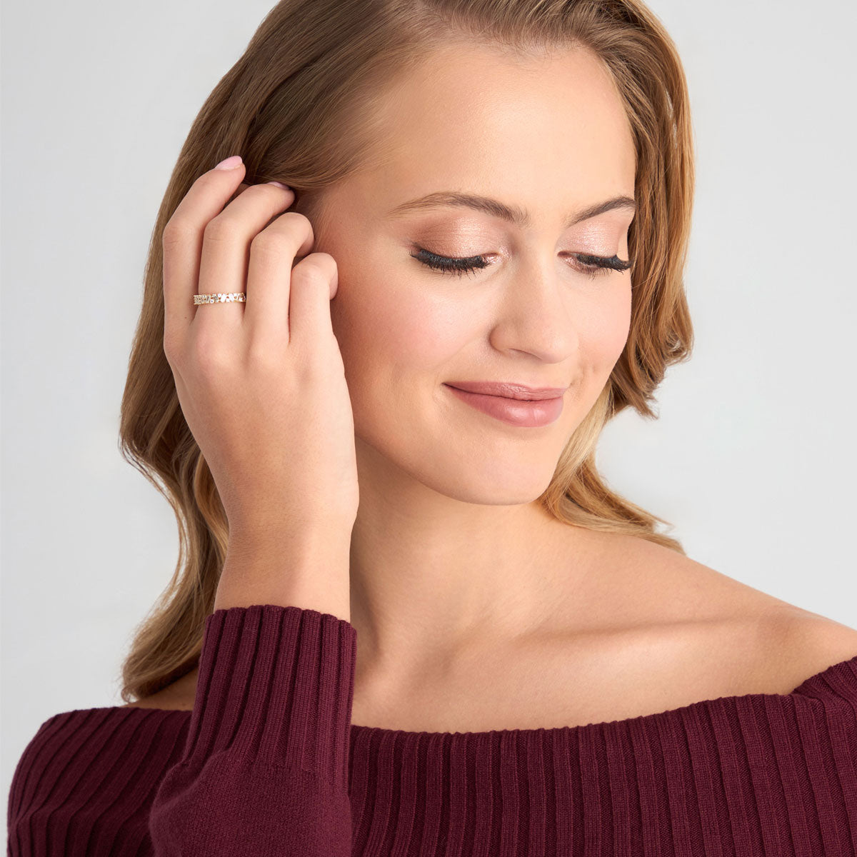 Pierścionek złoty z bezbarwnymi cyrkoniami