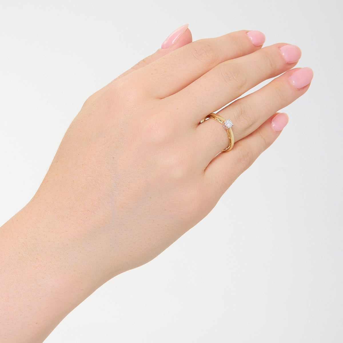 Pierścionek z dwukolorowego złota z diamentem